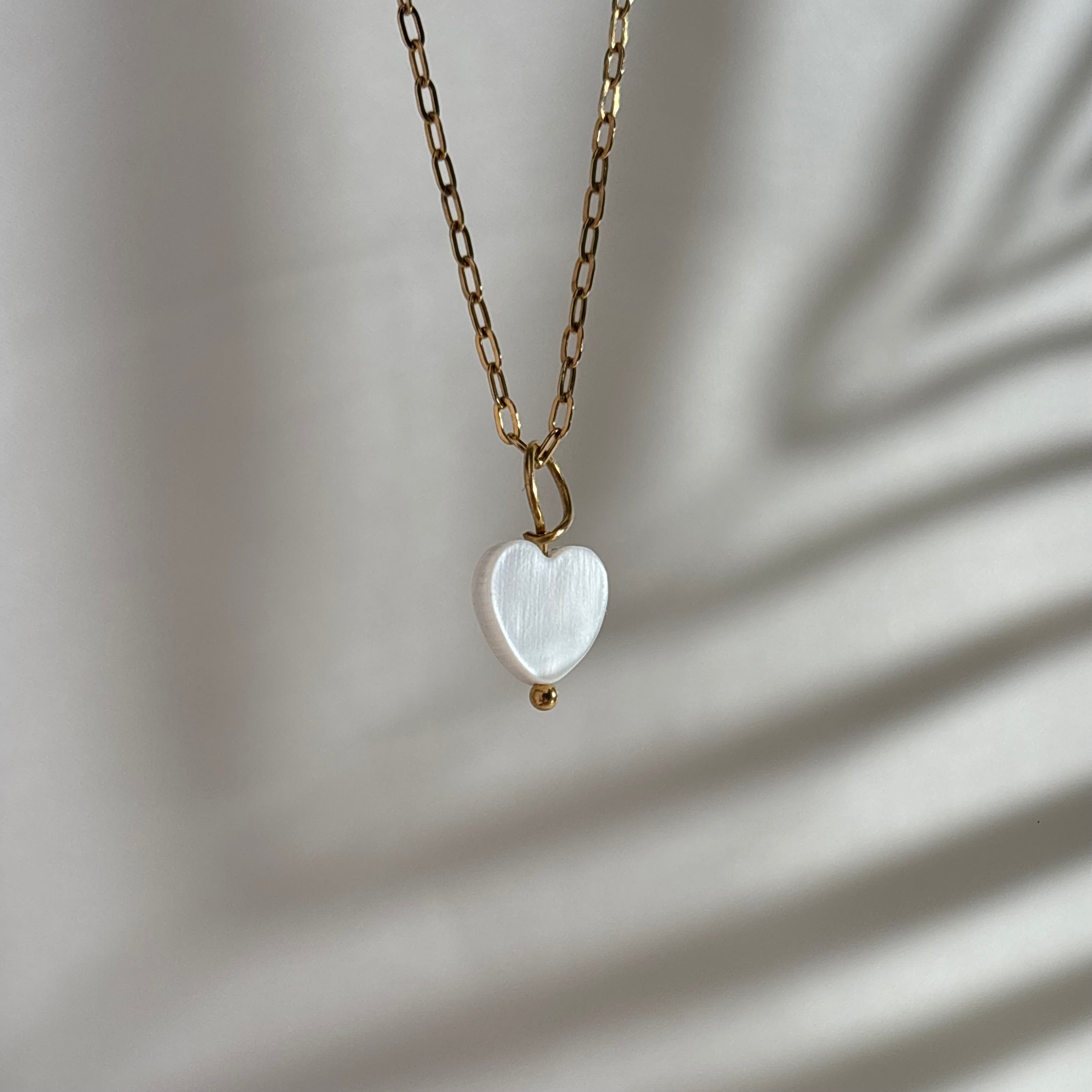 Perlmuttherz#Farbe_Gold