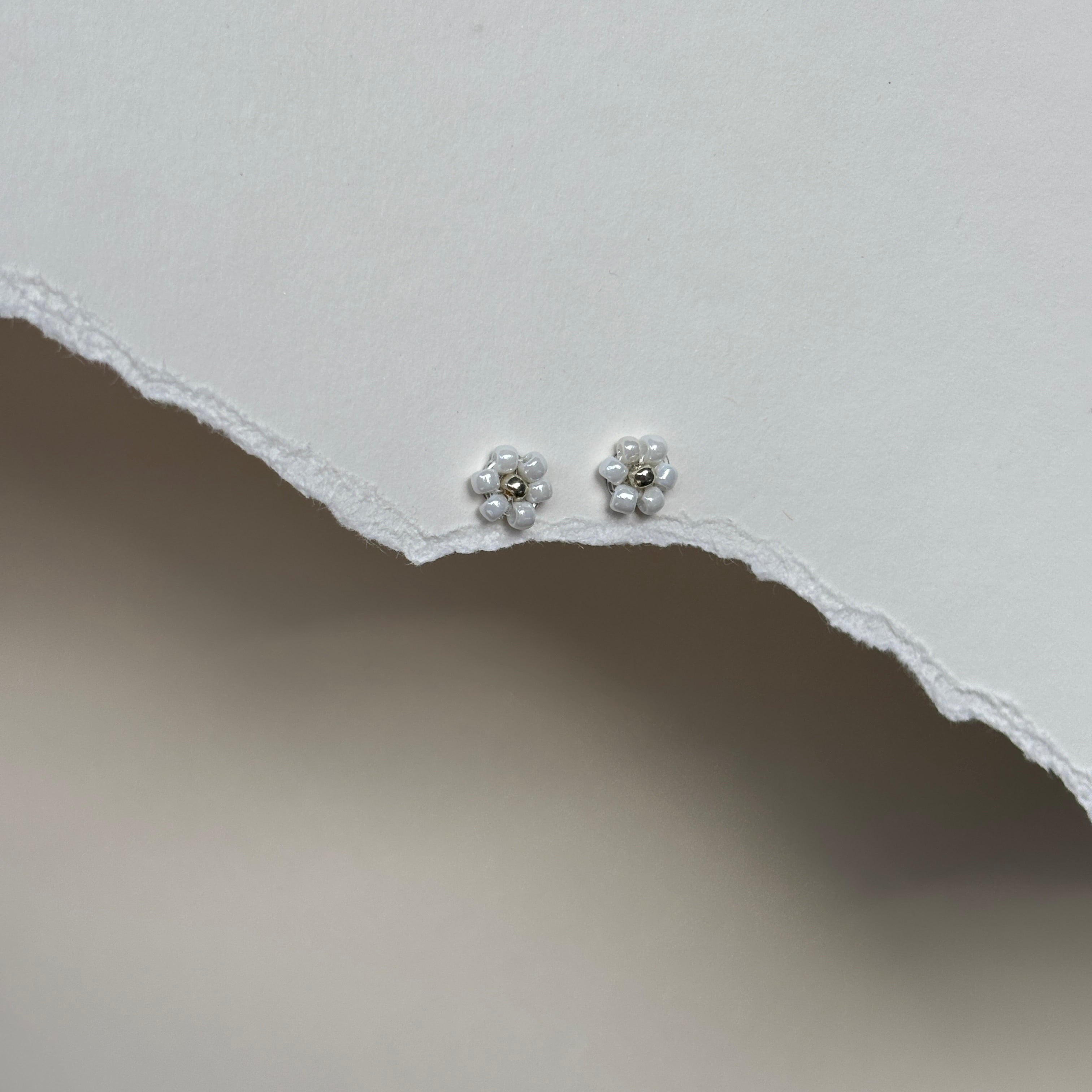 daisyohrstecker#Farbe_Silber